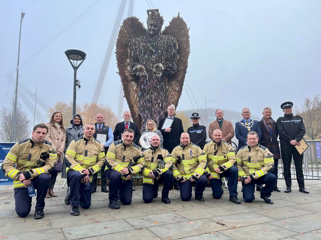 Group in front of knife angel