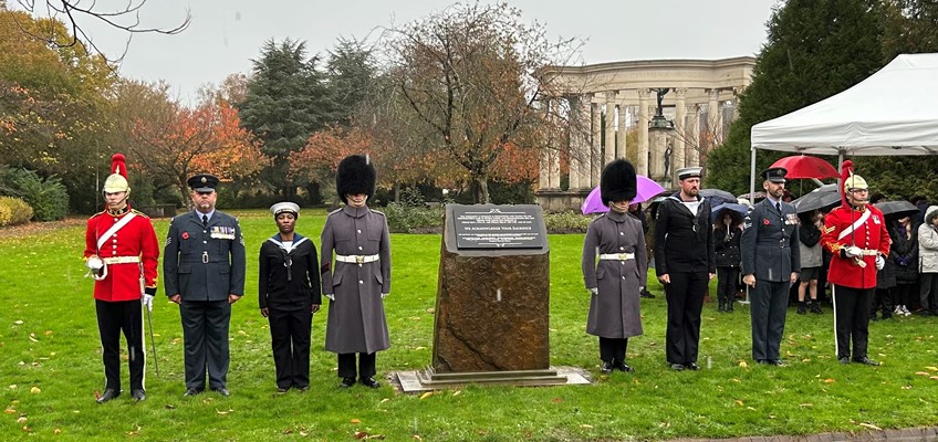 Members of the armed forces in uniform at remembrance event