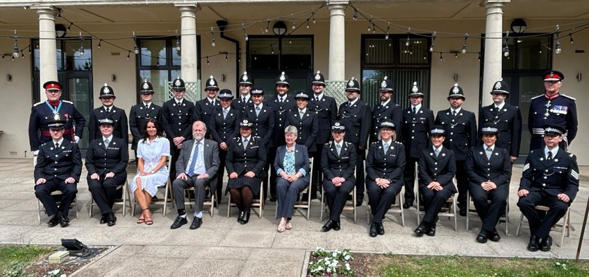 Jeff Cuthbert with officers at passing out parade.