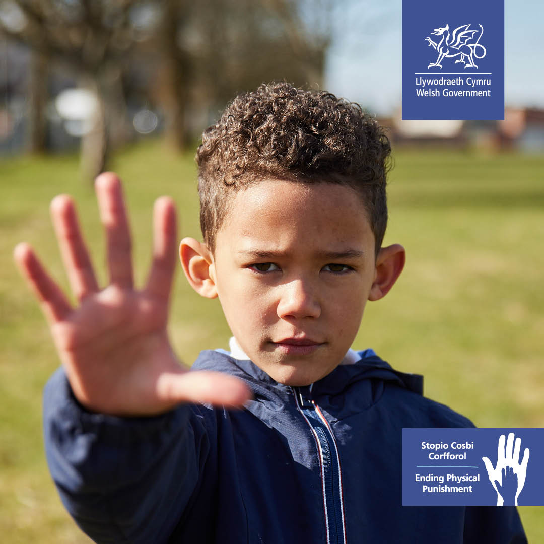 boy with hand stretched out indicating STOP