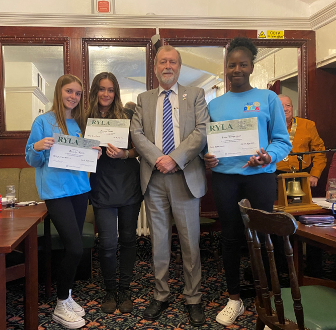 Jeff Cuthbert presenting certificates to members of Brynmawr youth organisations 
