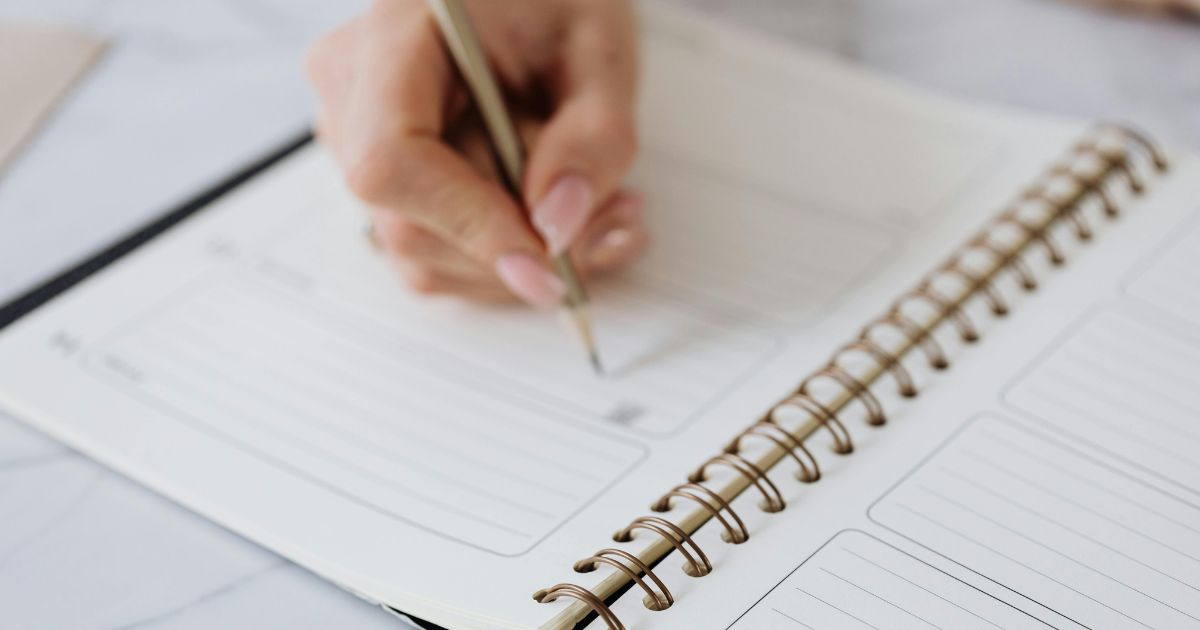 Hand writing on note pad