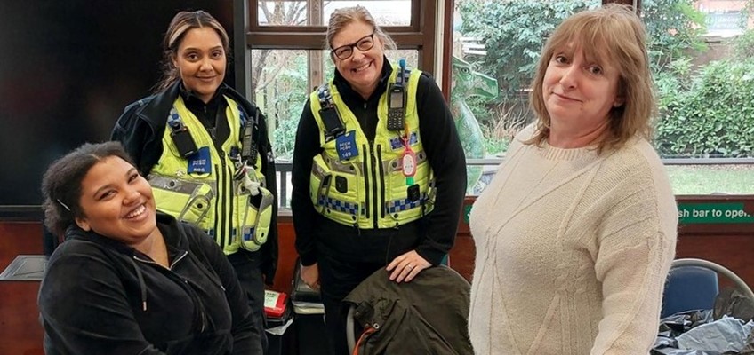 Police officers with members of the public