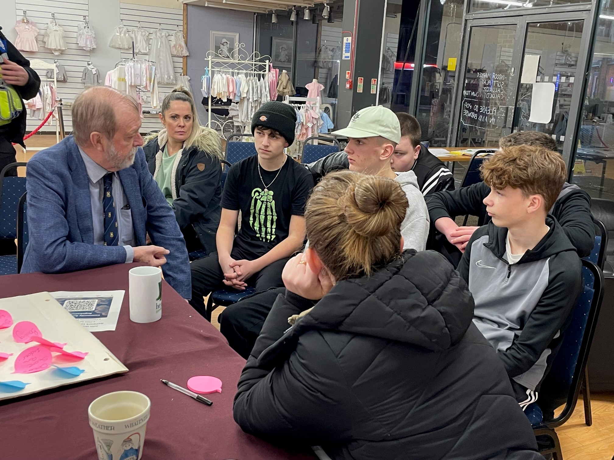 Jeff Cuthbert speaking with young people in Caldicot