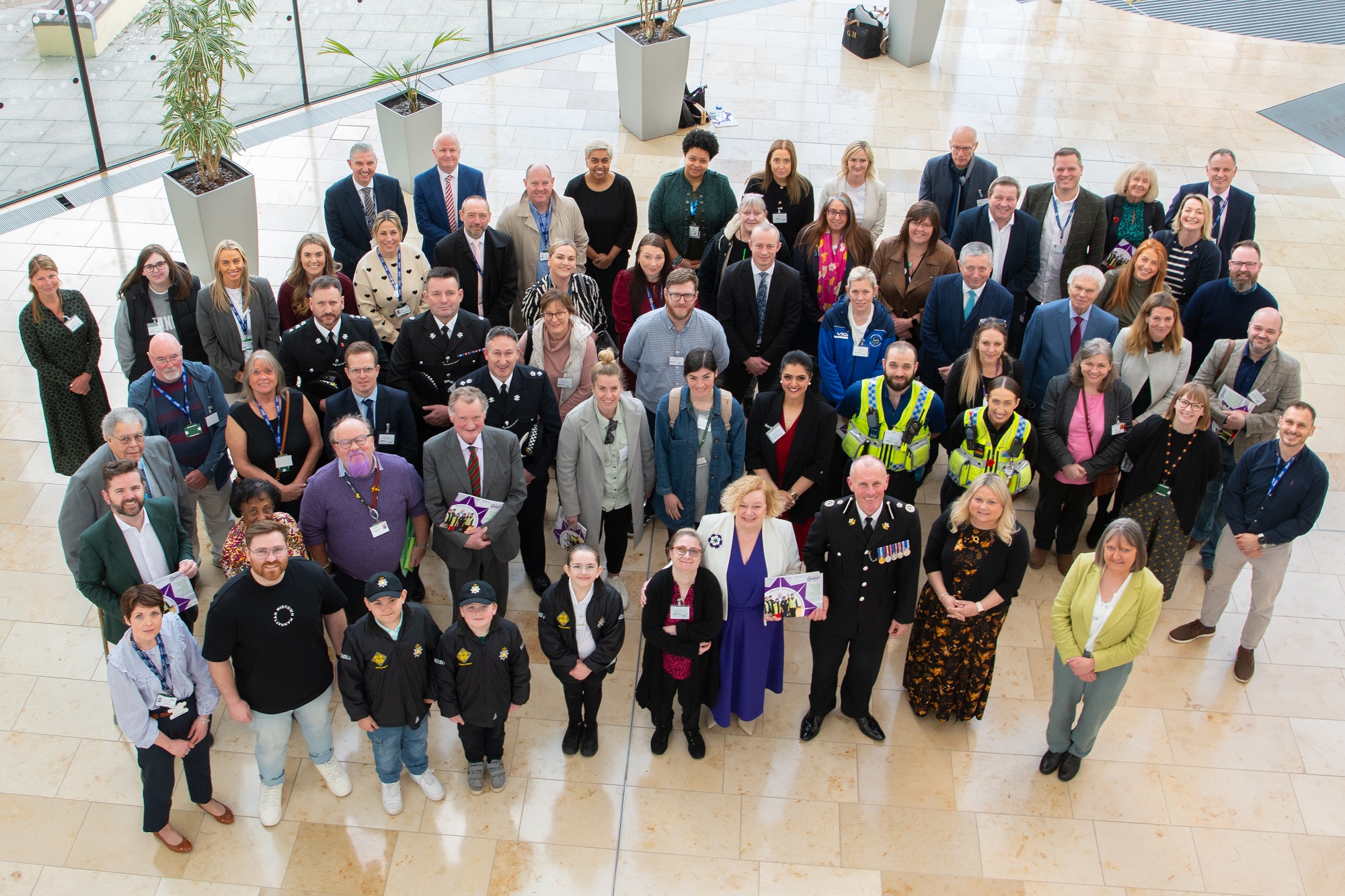 Jane Mudd with partners gathered for photo