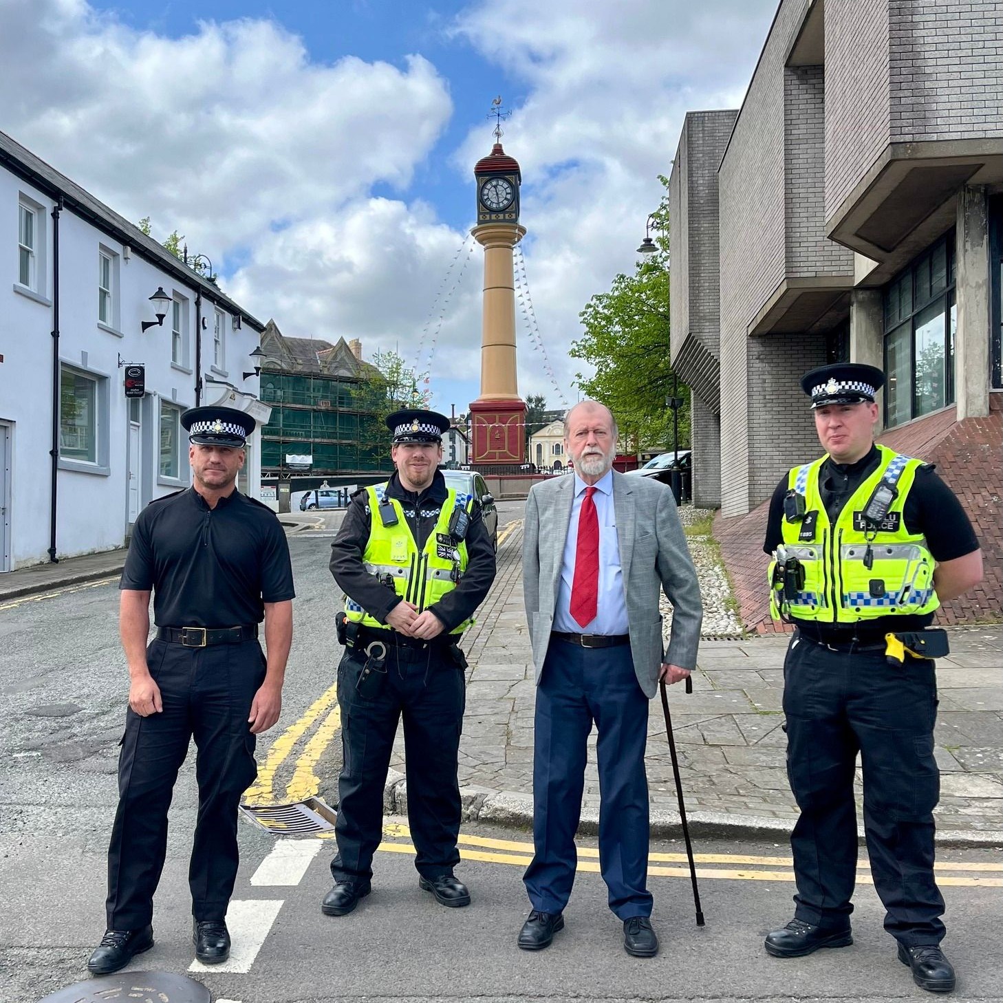 Jeff Cuthbert with police officers in Tredegar