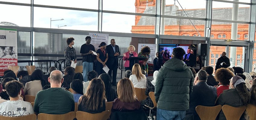 PCC Jane Mudd on stage in front of audience