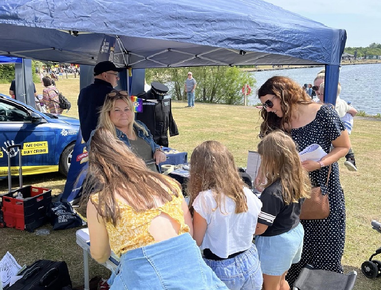 OPCC staff engaging with people at event.