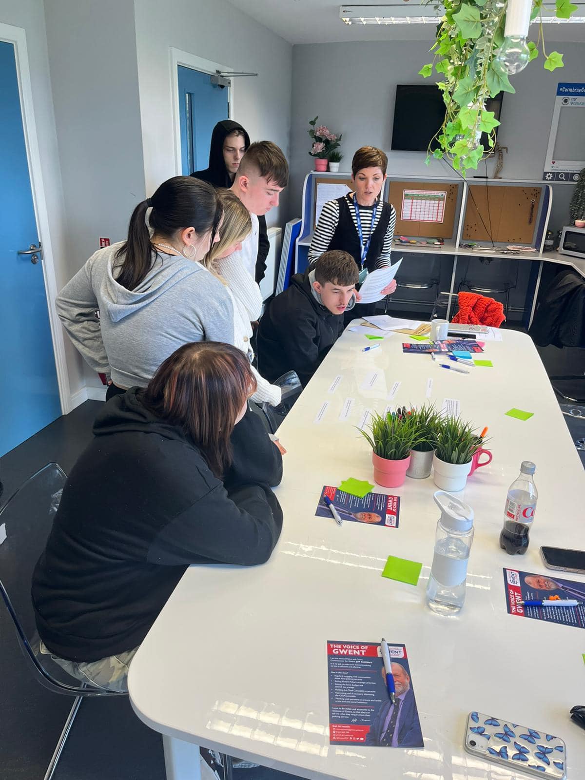 Young people working around a table