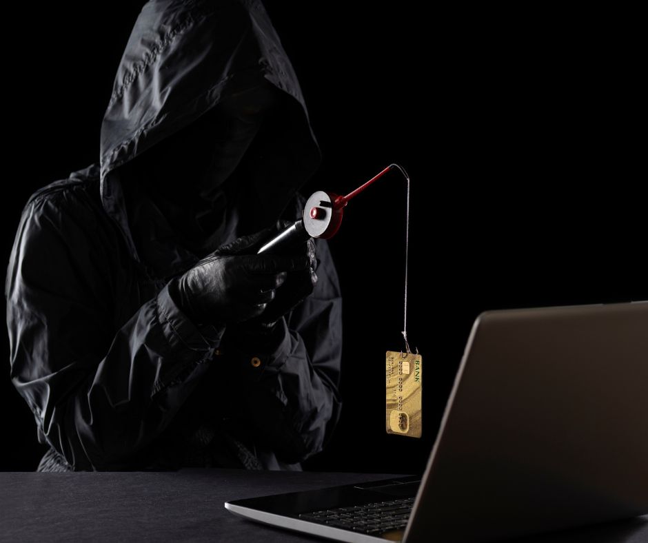 shrouded person with credit card on fishing line