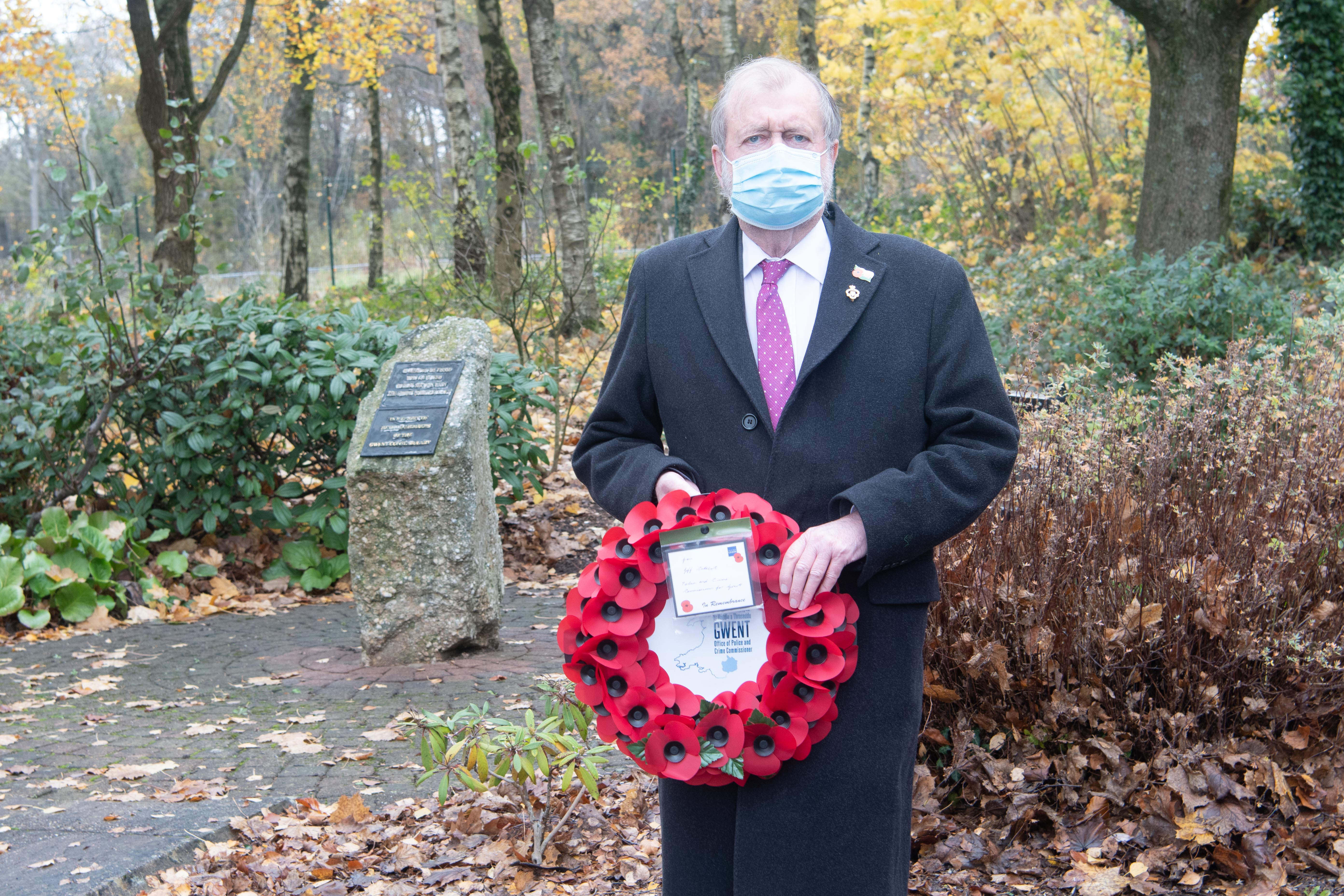 Jeff Cuthbert holding wreath