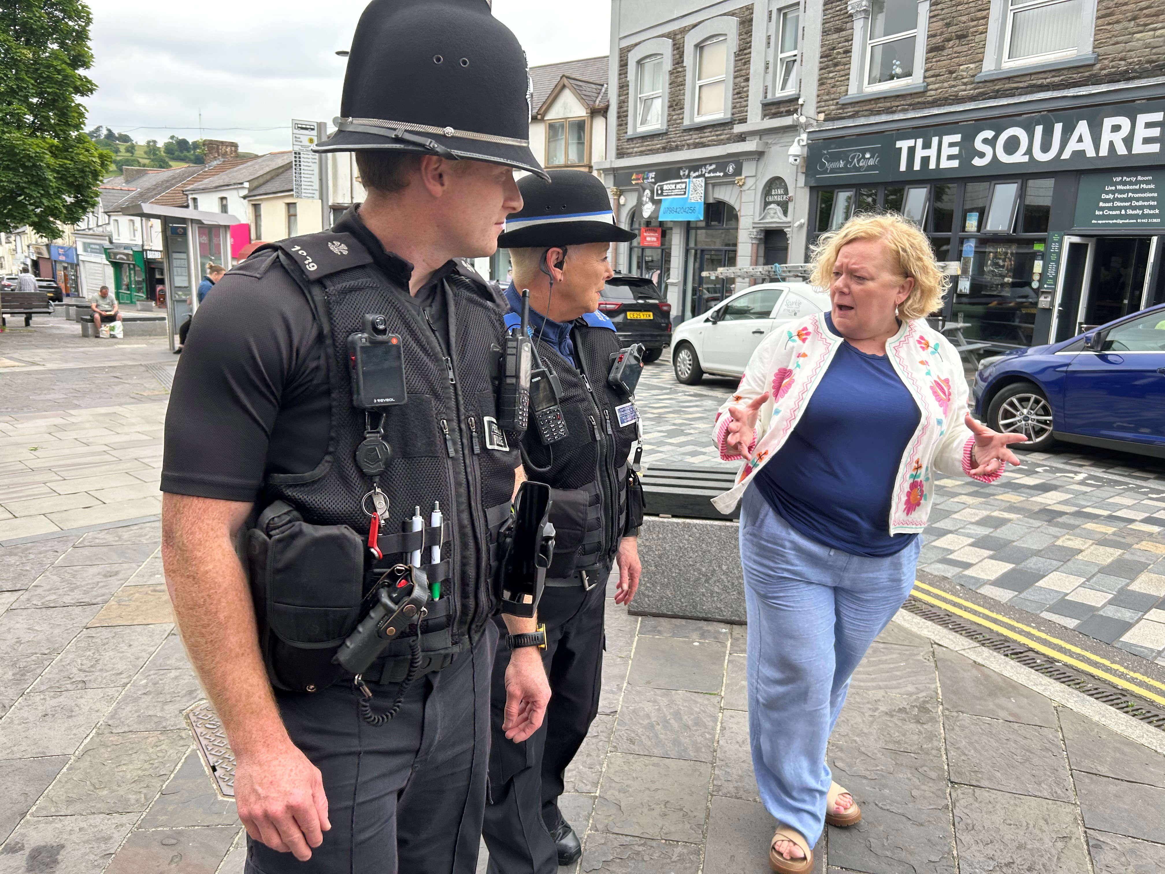Jane Mudd talking to officers